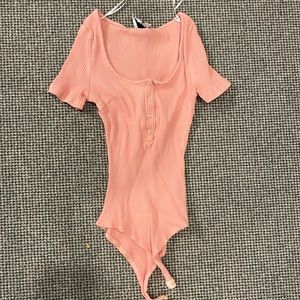 Pink snap body suit!! only worn twice